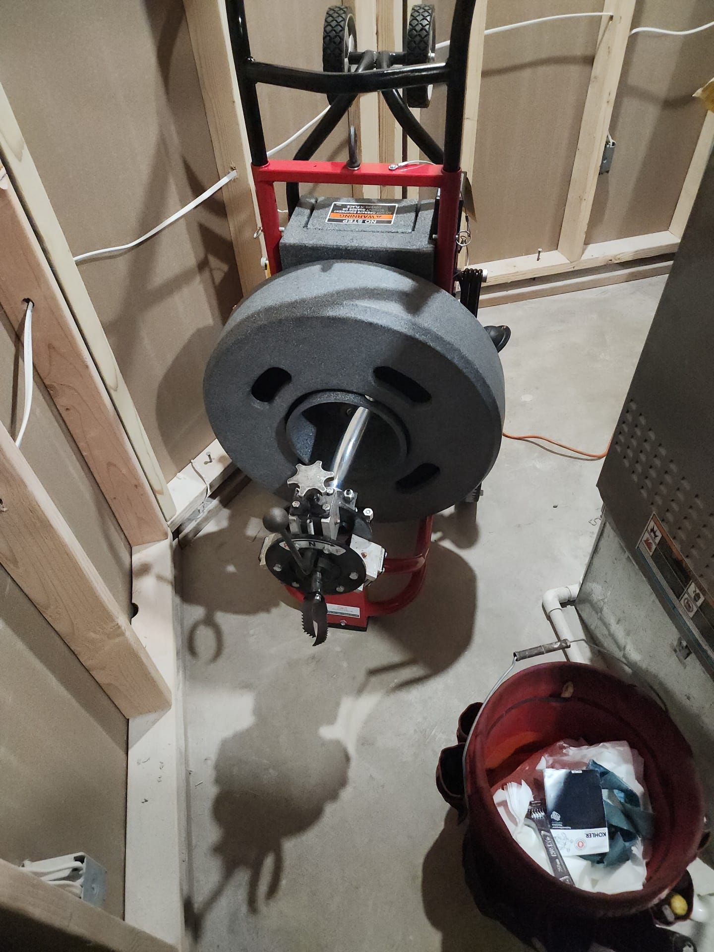 Professional drum machine clearing tough clog in Centennial bathroom