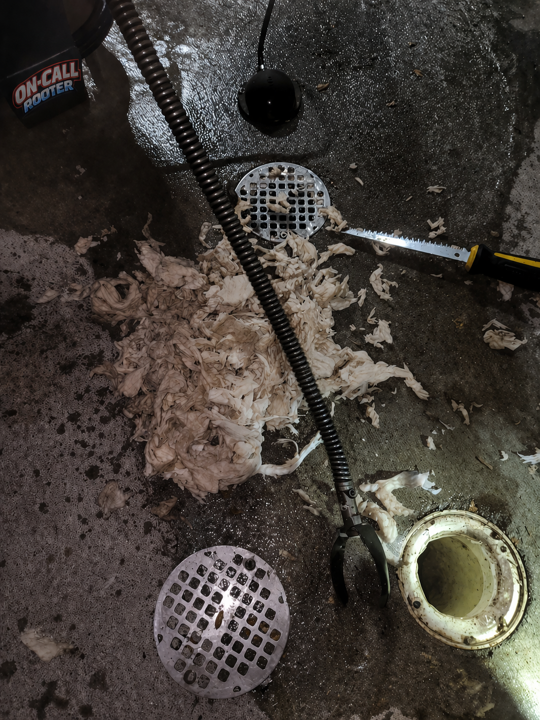 Massive hair clog removed from bathroom sink drain in Aurora home